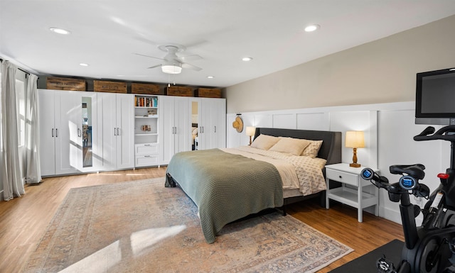 bedroom with light wood-style flooring and recessed lighting