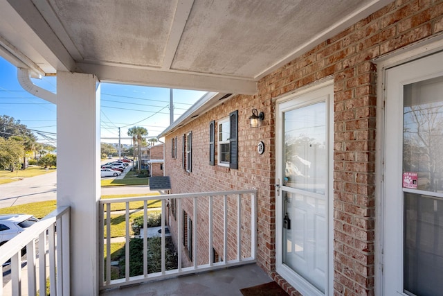 doorway to property featuring a porch