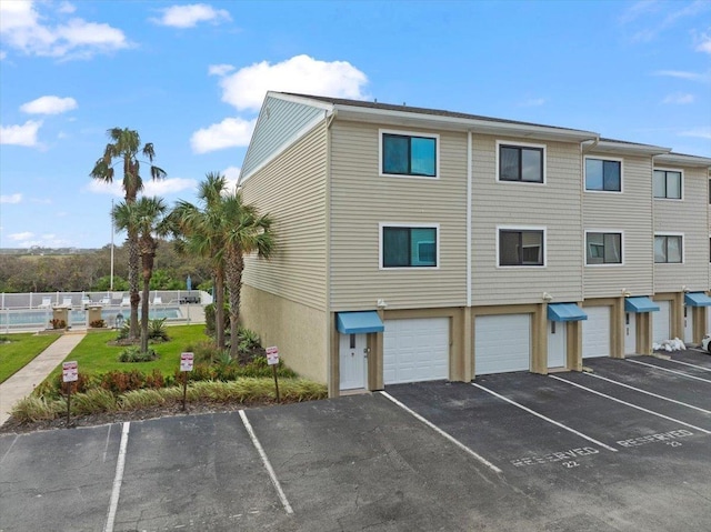 3385 Coastal Hwy Unit 23, Saint Augustine, FL 32084 - view of property featuring uncovered parking