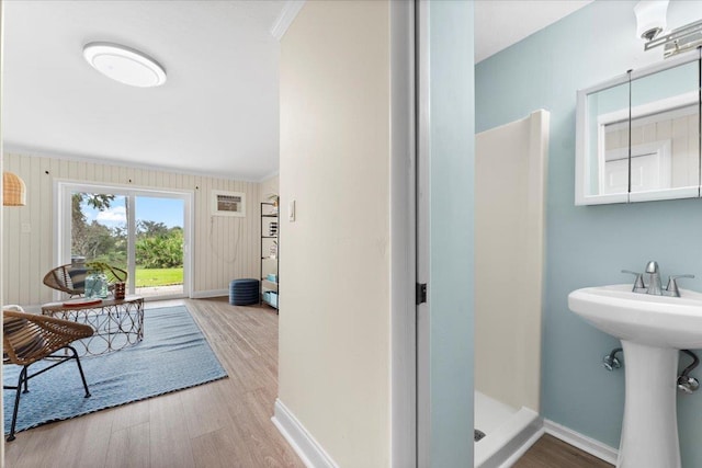 3385 Coastal Hwy Unit 23, Saint Augustine, FL 32084 - full bath with a stall shower, wood finished floors, and ornamental molding