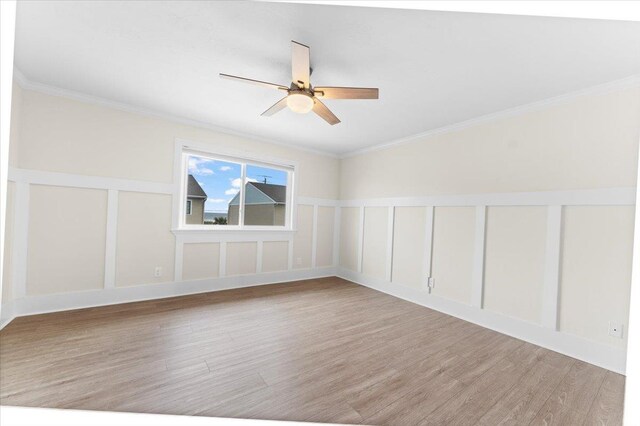 3385 Coastal Hwy Unit 23, Saint Augustine, FL 32084 - spare room featuring light wood finished floors, ceiling fan, and crown molding