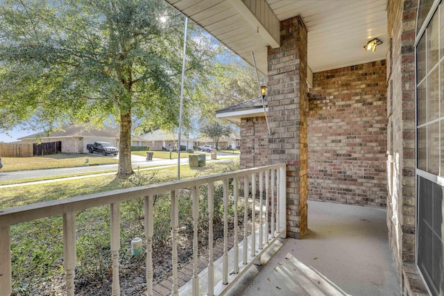 balcony featuring a porch