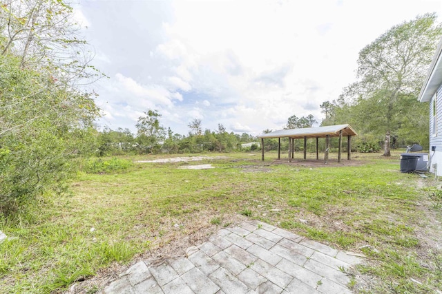 9610 Ebert Ave, Hastings, FL 32145 - view of grassy yard featuring a carport