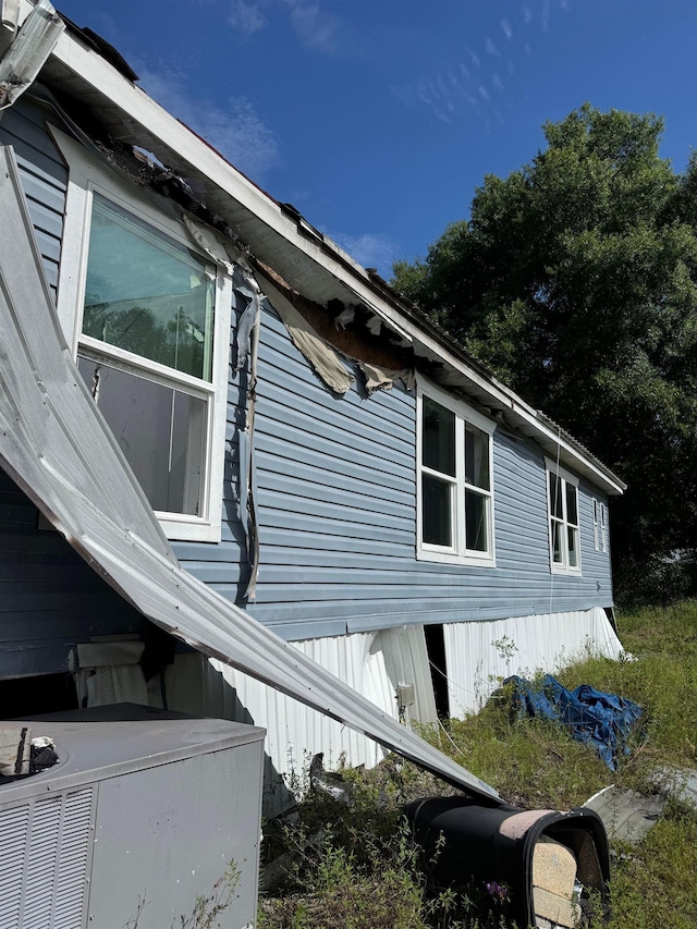 9610 Ebert Ave, Hastings, FL 32145 - view of side of property featuring a central AC unit