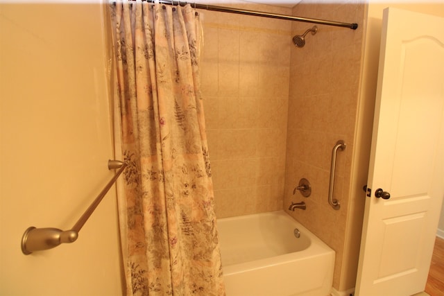 full bathroom with shower / tub combo with curtain