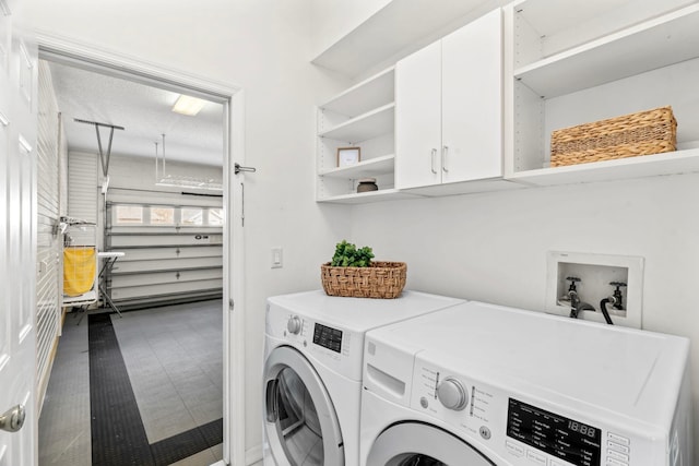 laundry area with independent washer and dryer