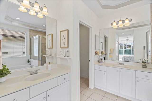 bathroom featuring crown molding, tile patterned flooring, vanity, plus walk in shower, and a raised ceiling