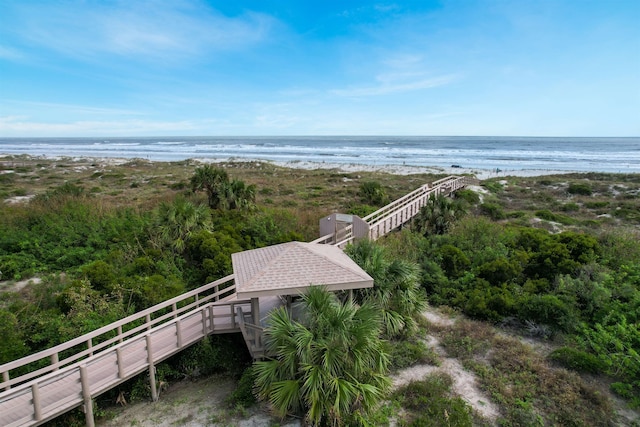 bird's eye view with a beach view and a water view