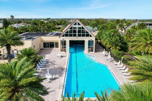 view of pool featuring a patio