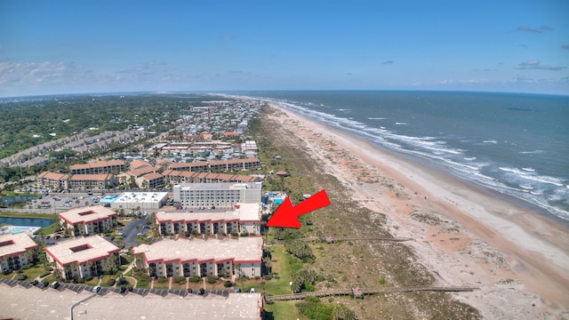 bird's eye view featuring a beach view and a water view