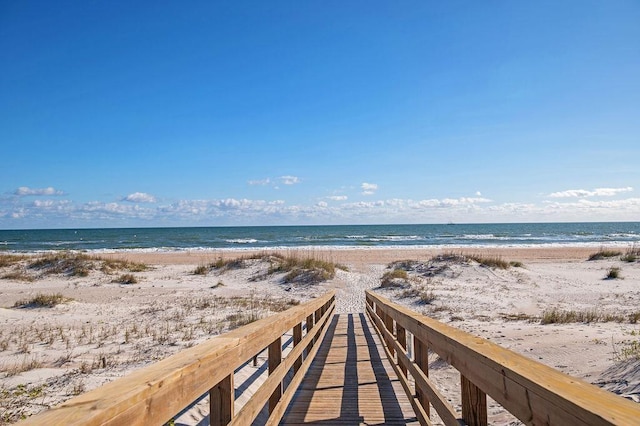 property view of water featuring a beach view