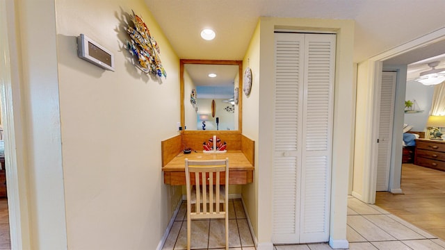 corridor featuring light hardwood / wood-style floors