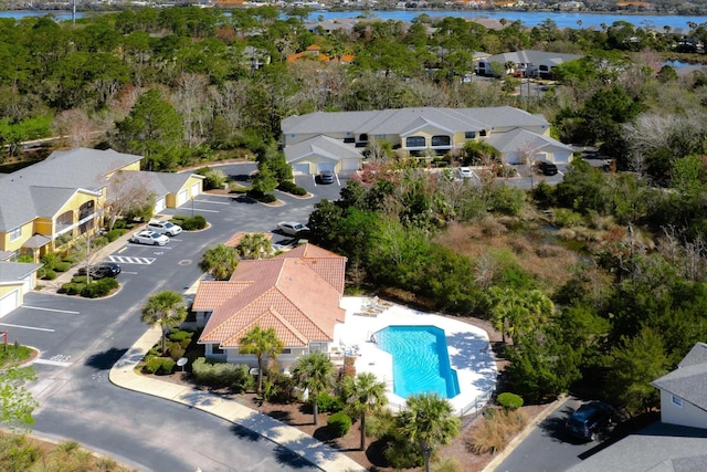 aerial view featuring a residential view and a water view