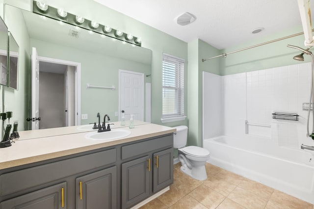 full bathroom featuring toilet, visible vents, bathing tub / shower combination, vanity, and tile patterned floors