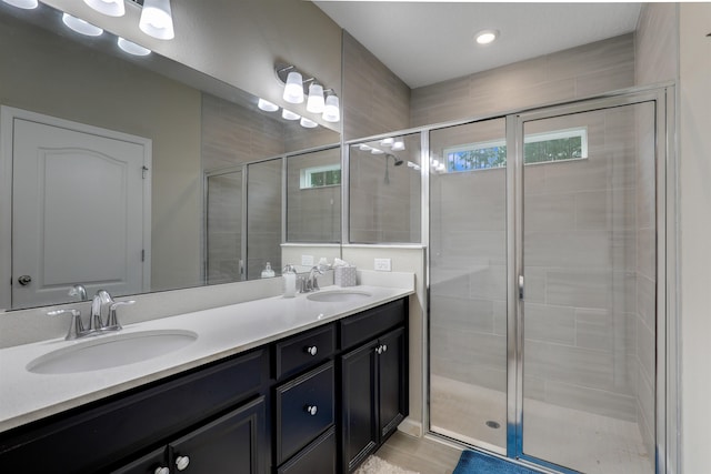 bathroom featuring vanity and walk in shower