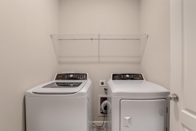 laundry room with washer and dryer