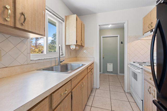 422 Nervia Ct, Saint Augustine, FL 32086 - kitchen featuring light tile patterned floors, a sink, electric stove, light countertops, and decorative backsplash