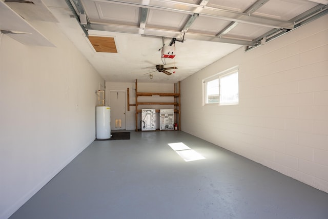 422 Nervia Ct, Saint Augustine, FL 32086 - garage featuring concrete block wall, water heater, and a garage door opener
