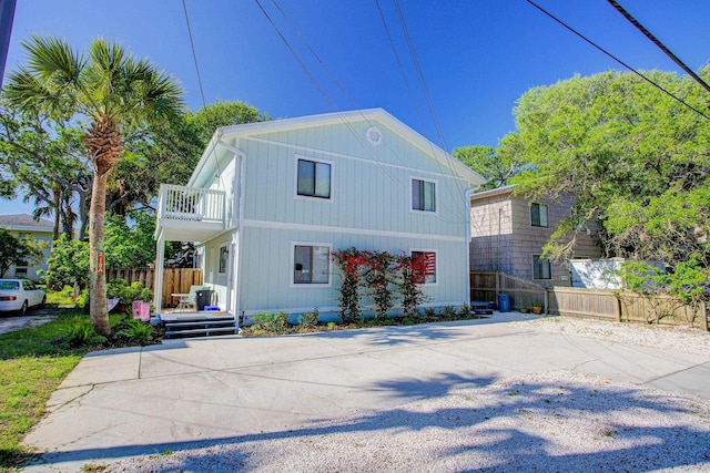 213 A St, Saint Augustine, FL 32080 - view of front of home with fence and a balcony