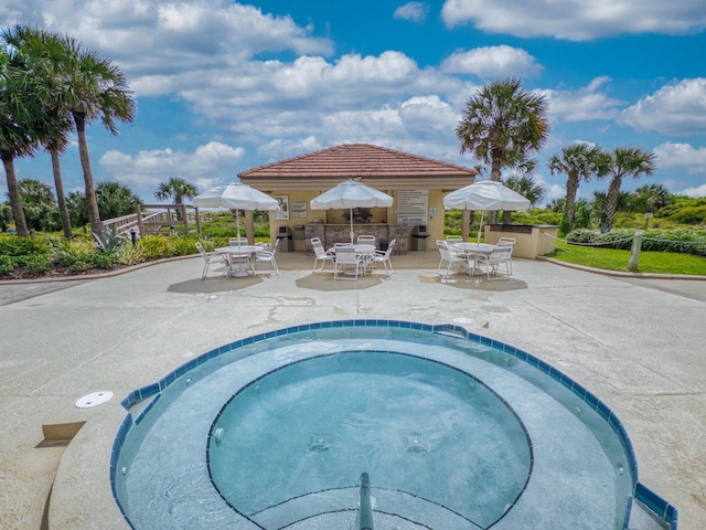 301 Premier Vista Way, Saint Augustine, FL 32080 - view of pool with outdoor dining area, a patio area, and a hot tub