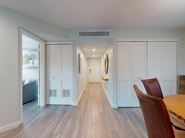 301 Premier Vista Way, Saint Augustine, FL 32080 - hallway with baseboards, visible vents, and light wood-type flooring