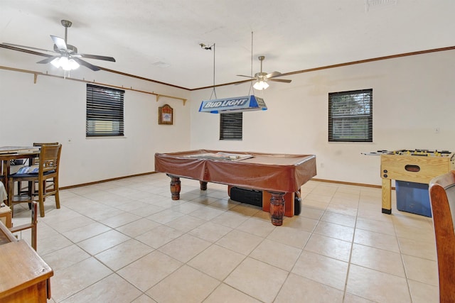 rec room with ceiling fan, light tile patterned floors, ornamental molding, and pool table