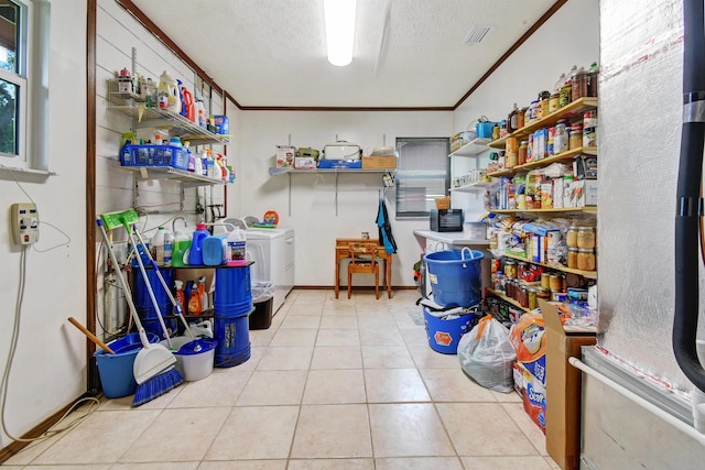 storage featuring washing machine and clothes dryer