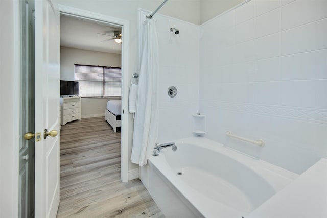 bathroom with ceiling fan, shower / tub combo with curtain, and wood-type flooring