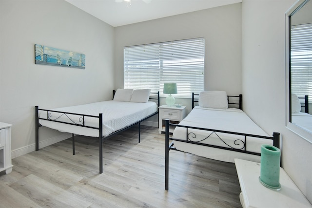 bedroom with light hardwood / wood-style floors