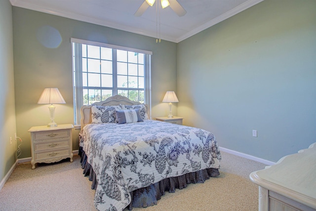 bedroom featuring ceiling fan, ornamental molding, and light colored carpet