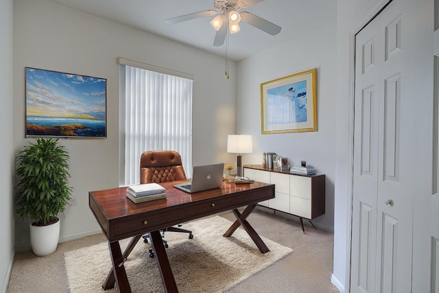 office area with ceiling fan and light colored carpet