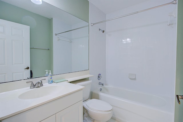 full bathroom featuring toilet, vanity, and  shower combination