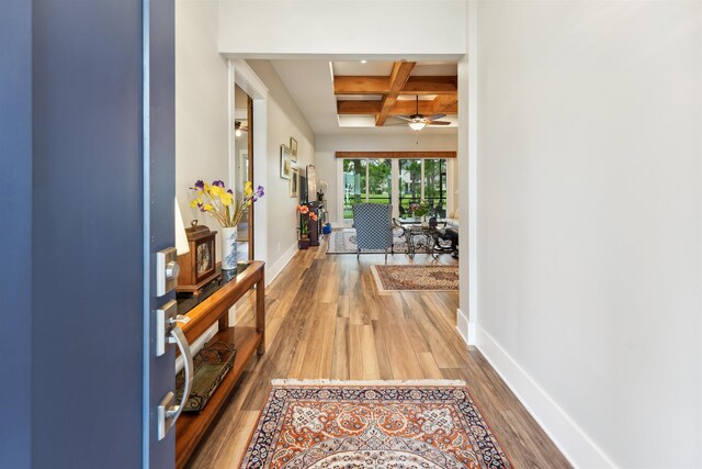 213 Pescado Dr, Saint Augustine, FL 32095 - hallway featuring coffered ceiling, baseboards, beamed ceiling, and wood finished floors