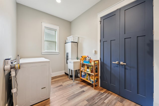 213 Pescado Dr, Saint Augustine, FL 32095 - laundry area featuring washer / clothes dryer, light wood-type flooring, recessed lighting, and baseboards