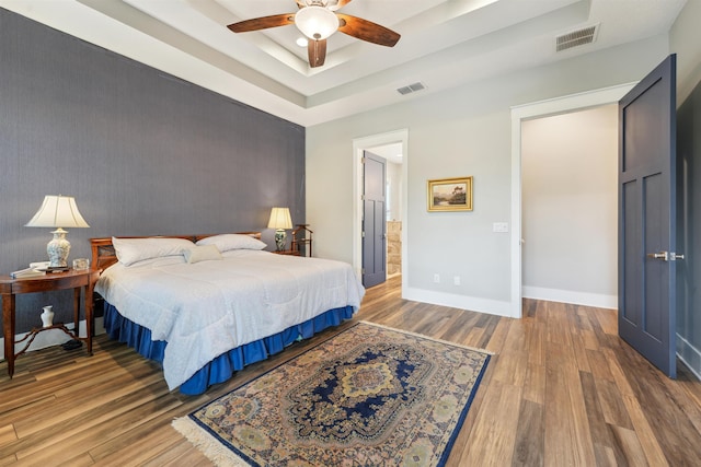 213 Pescado Dr, Saint Augustine, FL 32095 - bedroom with wood finished floors, a raised ceiling, baseboards, and a ceiling fan