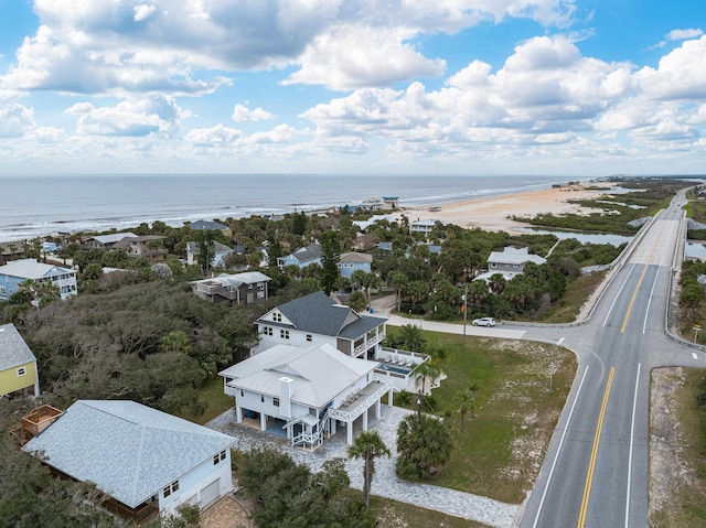 aerial view featuring a water view and a view of the beach