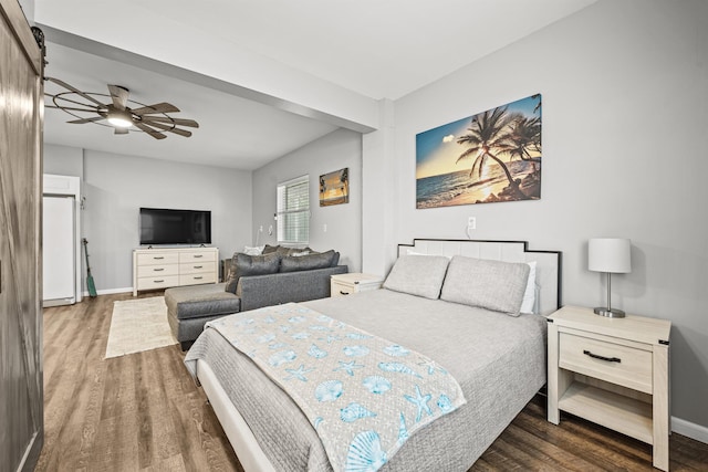 bedroom with dark hardwood / wood-style floors and ceiling fan