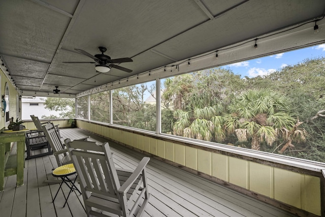 wooden terrace with ceiling fan