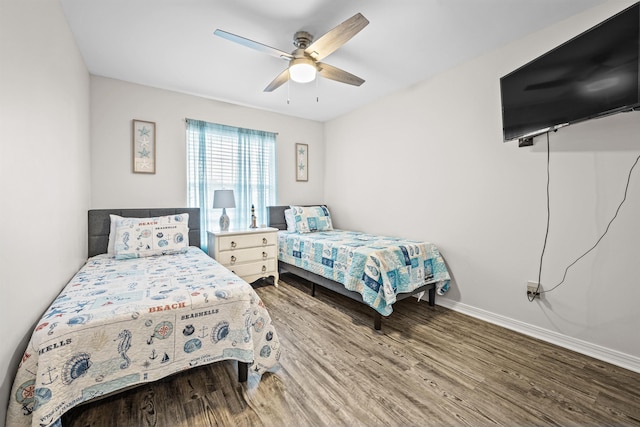 bedroom featuring hardwood / wood-style flooring and ceiling fan