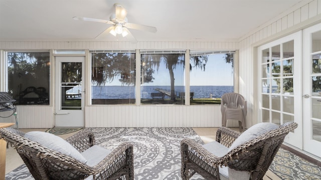 sunroom / solarium with ceiling fan