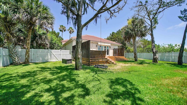 view of yard with a wooden deck