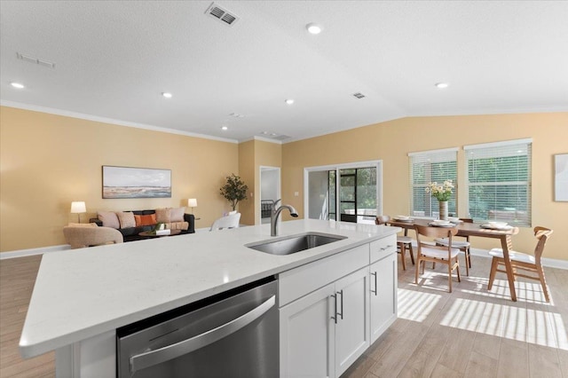 kitchen featuring sink, light hardwood / wood-style flooring, dishwasher, an island with sink, and white cabinets