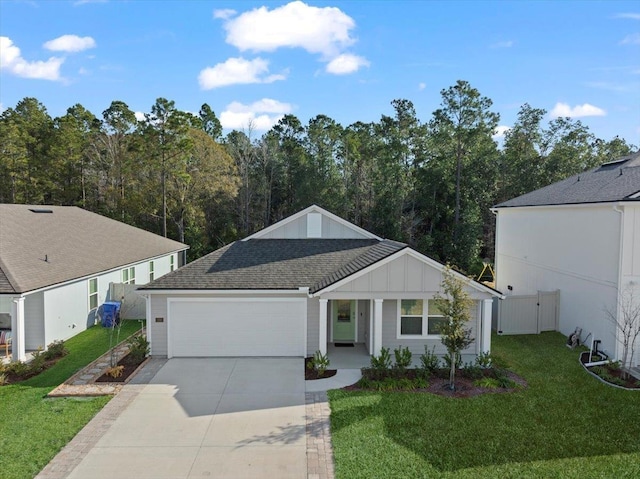 ranch-style house with a garage and a front yard