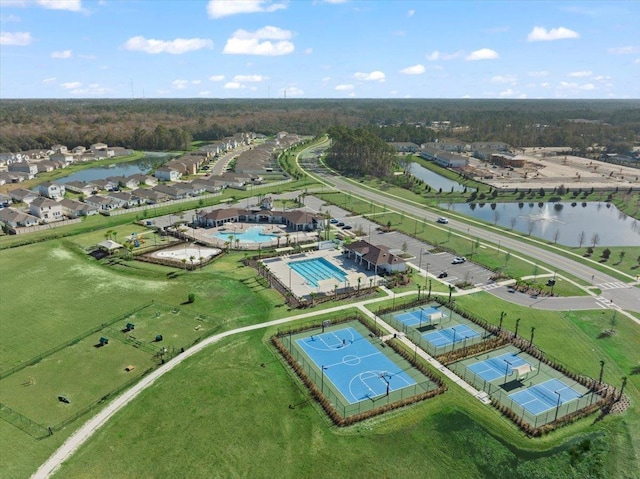 drone / aerial view with a water view