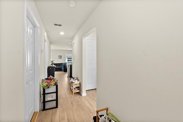 hallway featuring light wood-type flooring