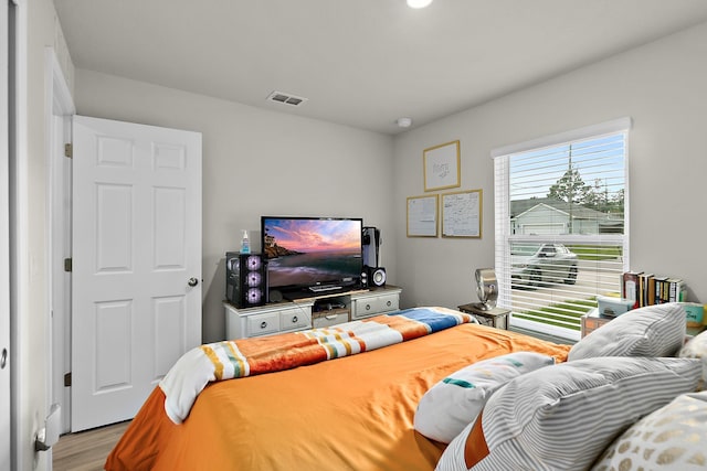 living room with light hardwood / wood-style flooring