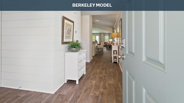 hallway with dark hardwood / wood-style floors