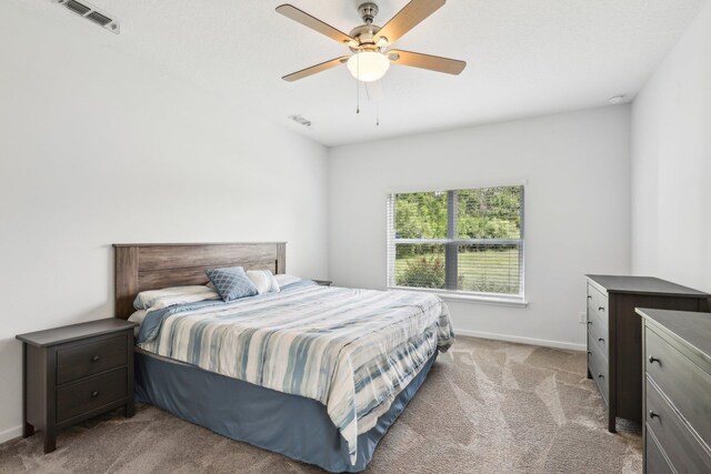 295 Deerfield Meadows Cir, Saint Augustine, FL 32086 - bedroom with light carpet and a ceiling fan