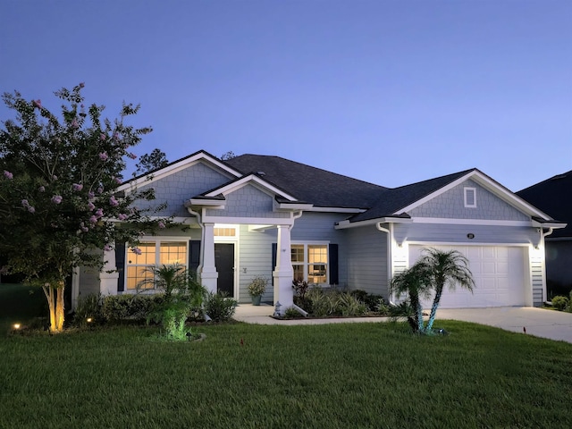 295 Deerfield Meadows Cir, Saint Augustine, FL 32086 - craftsman house featuring a front lawn, an attached garage, and driveway