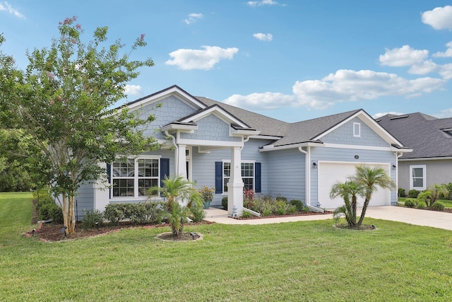 295 Deerfield Meadows Cir, Saint Augustine, FL 32086 - craftsman house featuring a garage, concrete driveway, a front yard, and roof with shingles